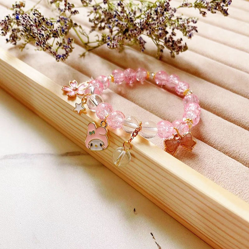Elegantes Armband mit Tier- und Glitzeranhängern Brehn