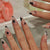 Künstlerisches Press-On-Nagelset mit Sternendesign Brehn
