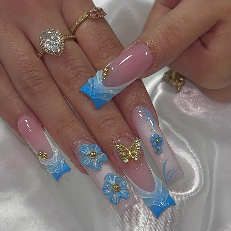 Künstlerisches Press-On-Nagel-Set mit floralen und Schmetterlingsdesigns Brehn