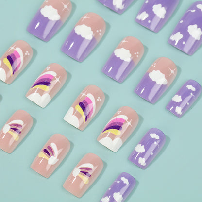 Kreatives Nail Art Set mit bunten Regenbogen- und Wolkenmotiven Brehn