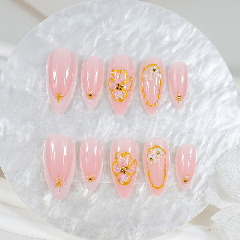 Kunstnagelset mit eleganten floralen und glamourösen Details Brehn