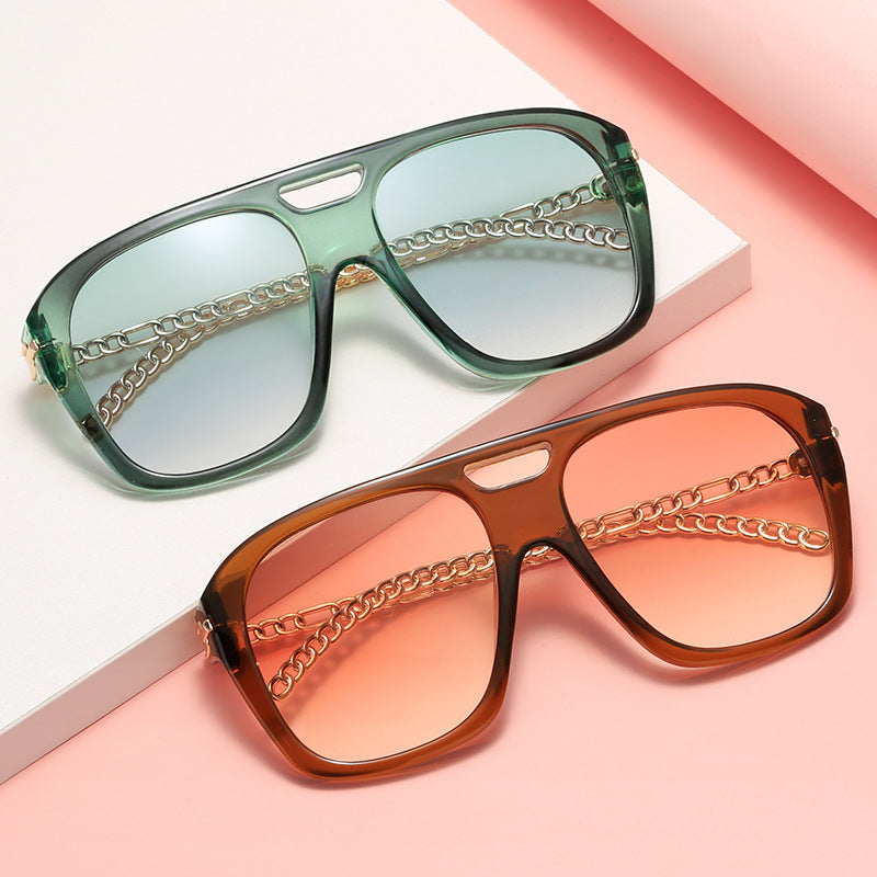 Damen Luxuriöse Sonnenbrille mit einzigartigem Kettenrahmen Brehn