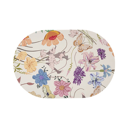 Ovales abwischbares Tischset aus Vinyl mit floralem Retro-Muster und rutschfester Rückseite Brehn