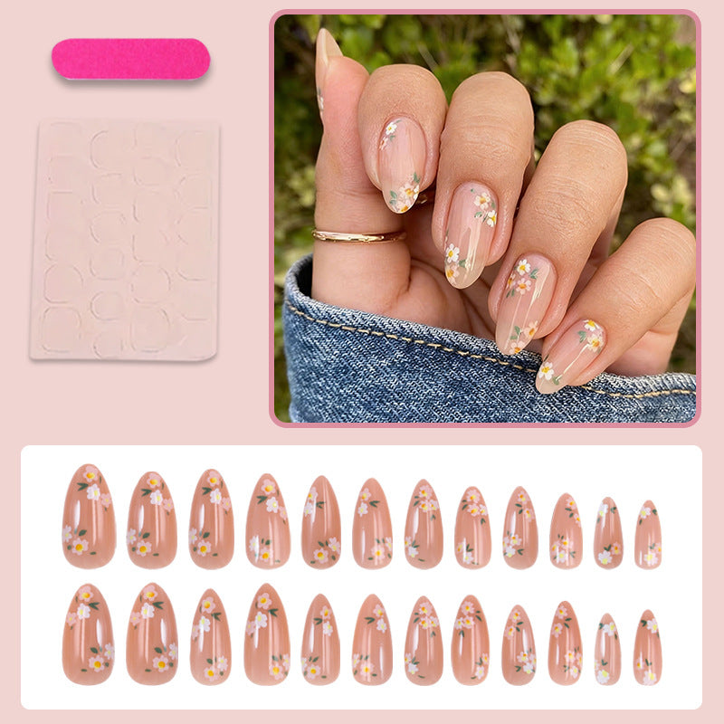 Kunstnagelset mit floralen Designs und natürlichem Look Brehn