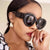 Damen extravagante Sonnenbrille mit kreativem Rahmendesign und schützendem UV-Filter Brehn