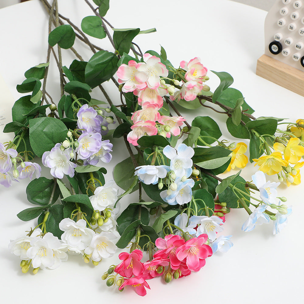 Künstlicher Blütenzweig mit lebhaften rosa Blüten Brehn