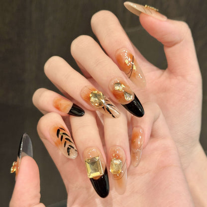 Künstlerische Gel Press-On Nägel mit geometrischen und Edelsteinakzenten