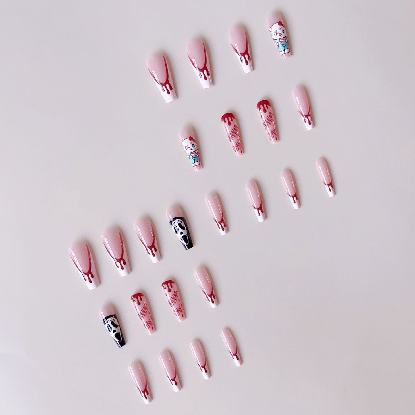 Kunstnagelset mit kreativem Halloween-Design und blutigen Akzenten Brehn
