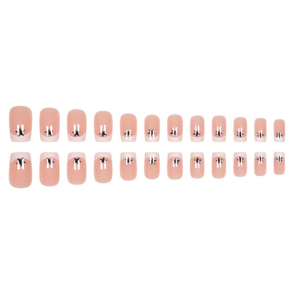 Künstlerische French Tip Press-On Nägel mit Sternakzenten Brehn