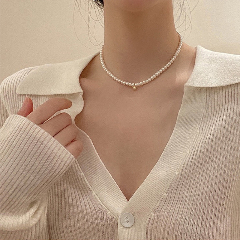 Zarte Perlenhalskette mit Eleganter Goldakzent Brehn