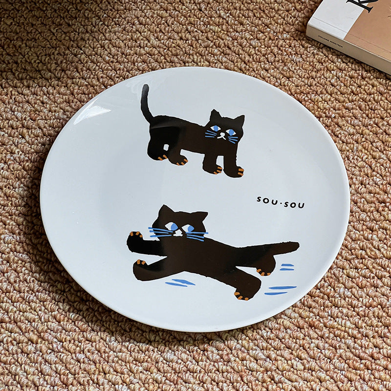 Keramikteller mit verspieltem Katzenmotiv und matt-glänzender Glasur