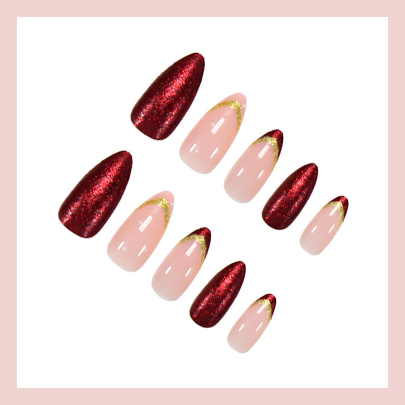 Kunstnagelset mit luxuriösen Glitzerverzierungen und starren Spitzen Brehn