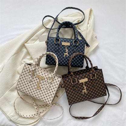 Elegante gemusterte Handtasche