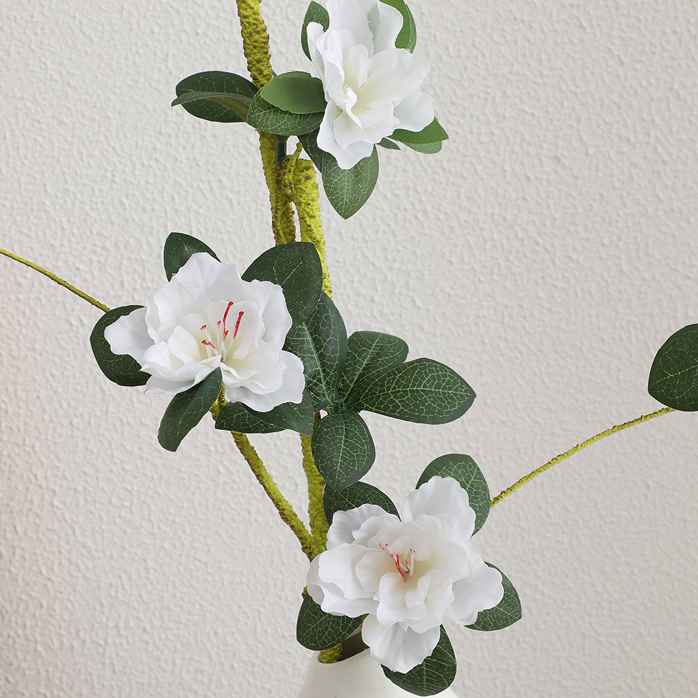Eleganter Kunstblütenzweig mit realistischen Blüten und Blättern Brehn