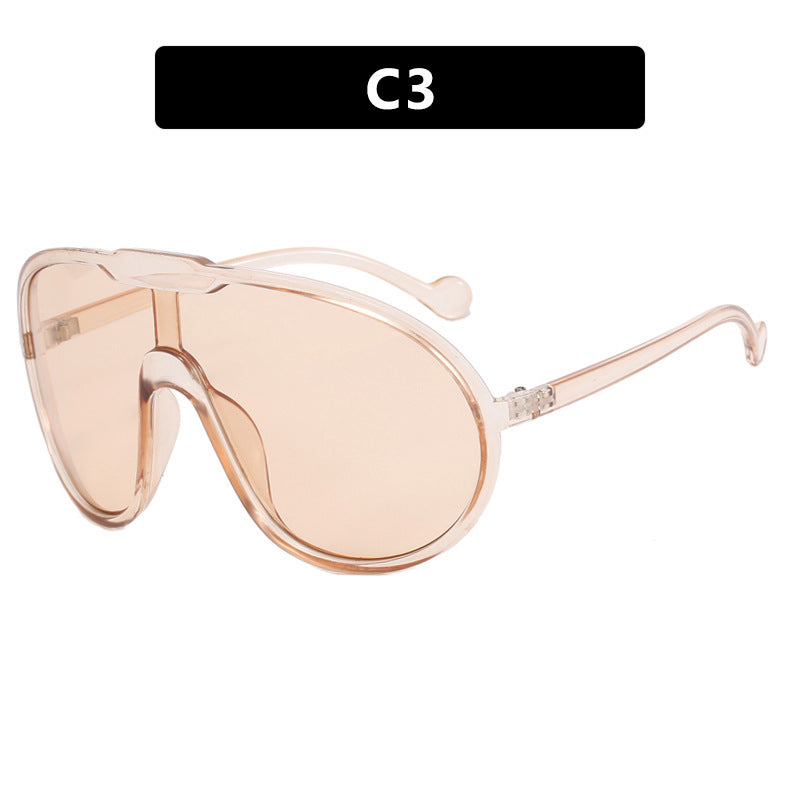 Damen Sportliche Sonnenbrille mit breitem Rahmen und gelben Gläsern Brehn