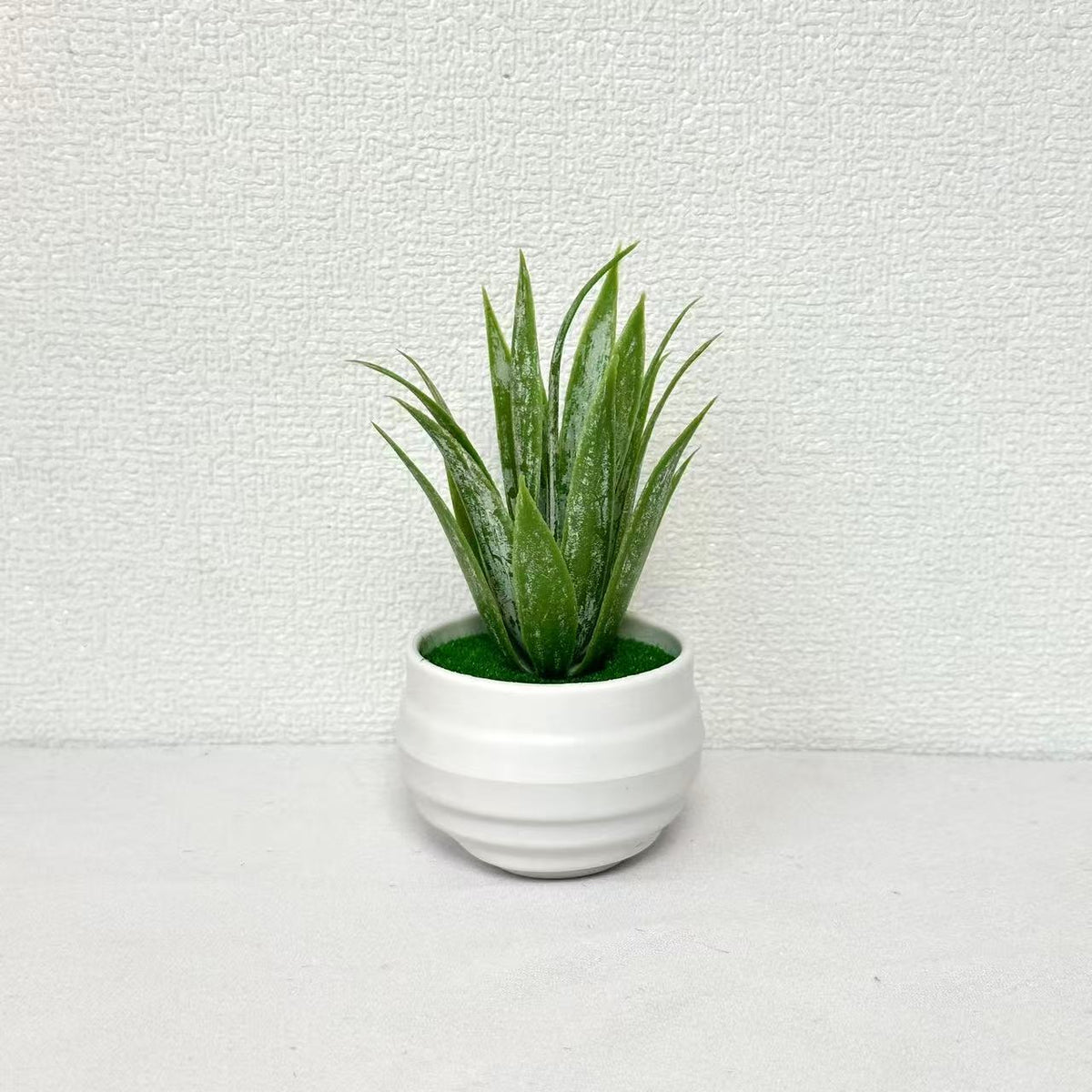 Künstliches Orchideen-Blumenarrangement für die Wohnraumausstellung