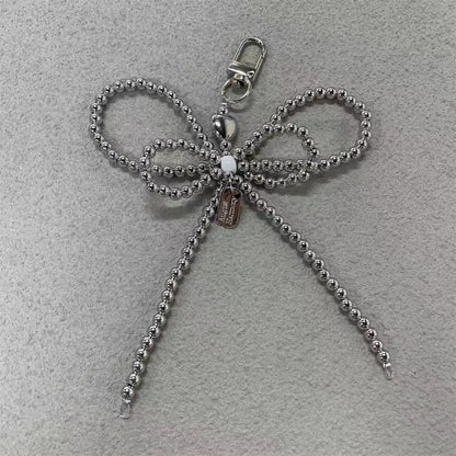 Elegante Perlenbogen Schlüsselanhänger Brehn