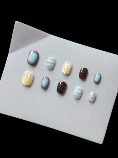 Künstlerisches Press-On-Nagelset mit Ombre- und Textur-Akzenten