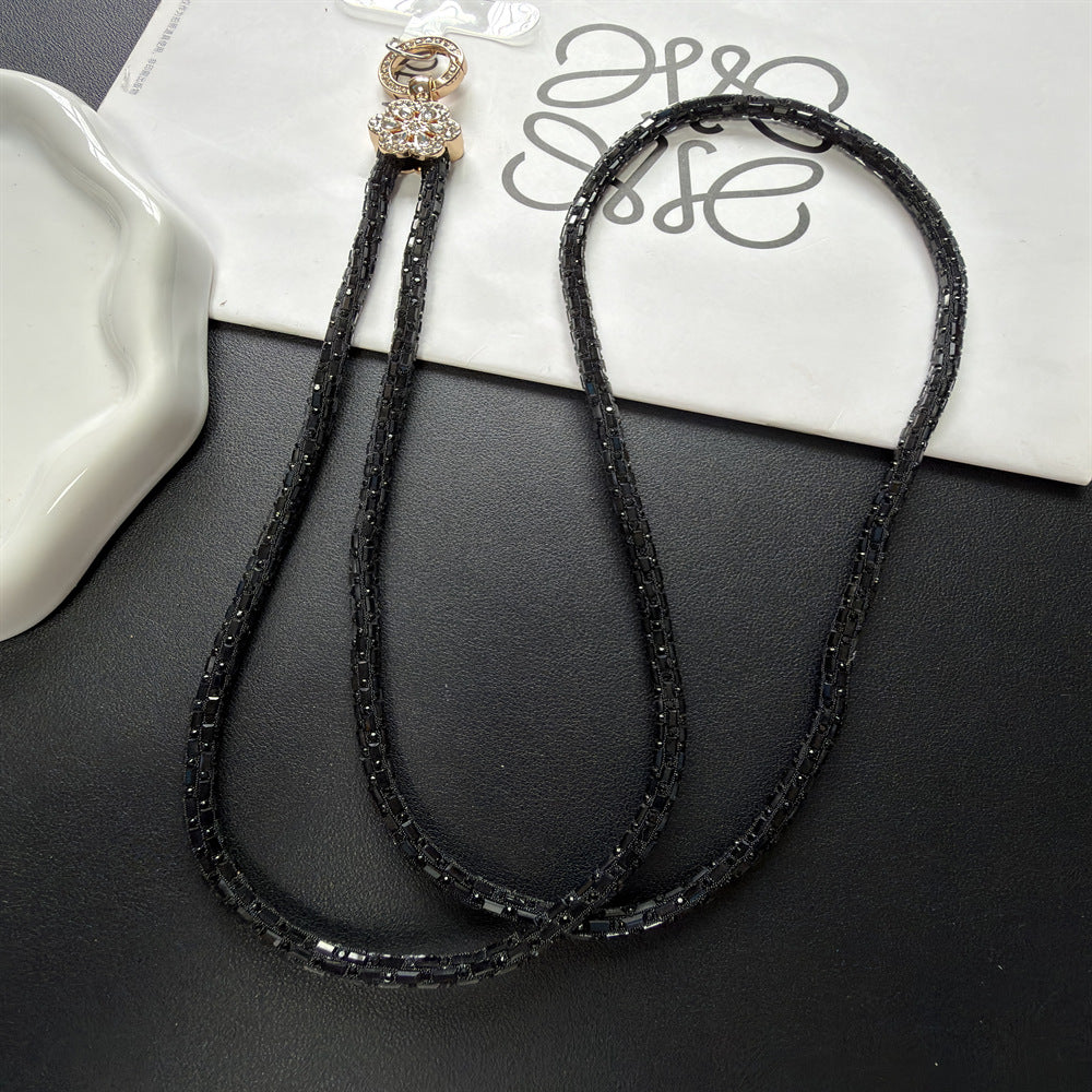 Dekorativer, mit Kristallperlen verzierter Brillenband Brehn