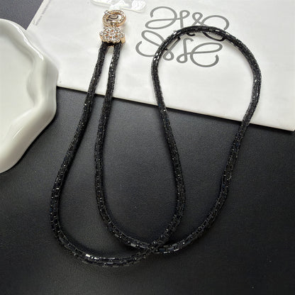 Dekorativer, mit Kristallperlen verzierter Brillenband Brehn