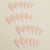 Kunstnagelset mit dekorativem French-Tip-Design Brehn