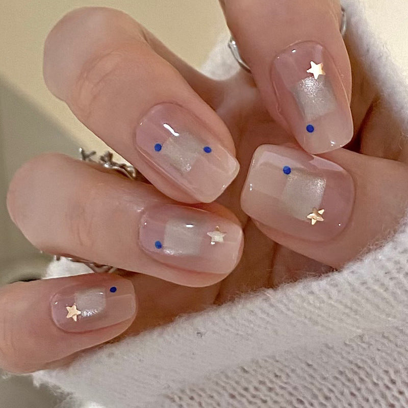 Elegantes Press-On-Nageldesign-Set mit Stern- und Punktmustern Brehn