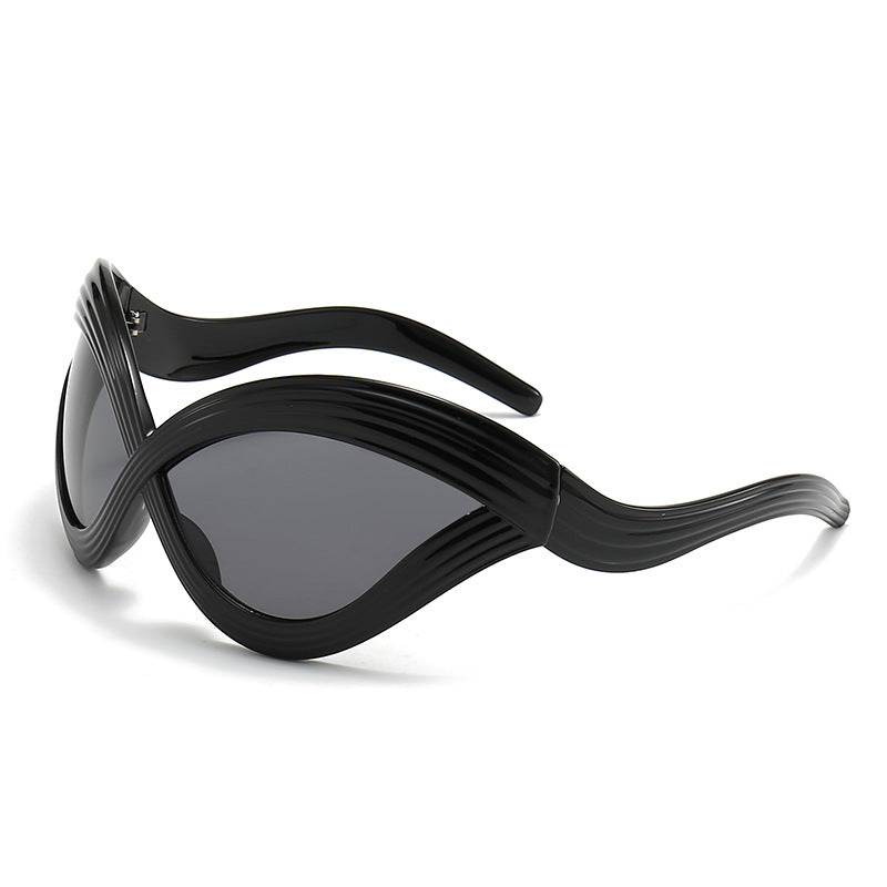 Damen außergewöhnliche Sonnenbrille mit geschwungenem Design Brehn