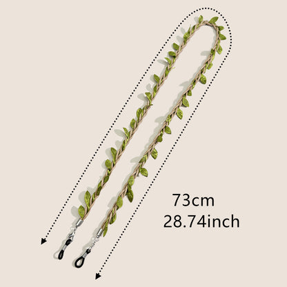 Dekorativer Brillenband mit Blattakzenten Brehn