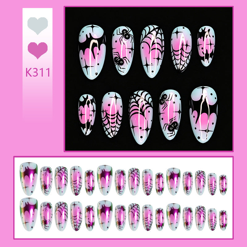 Kreatives Kunstnagelset mit gruseligem Spinnenmotiv und farbenfrohem Design Brehn