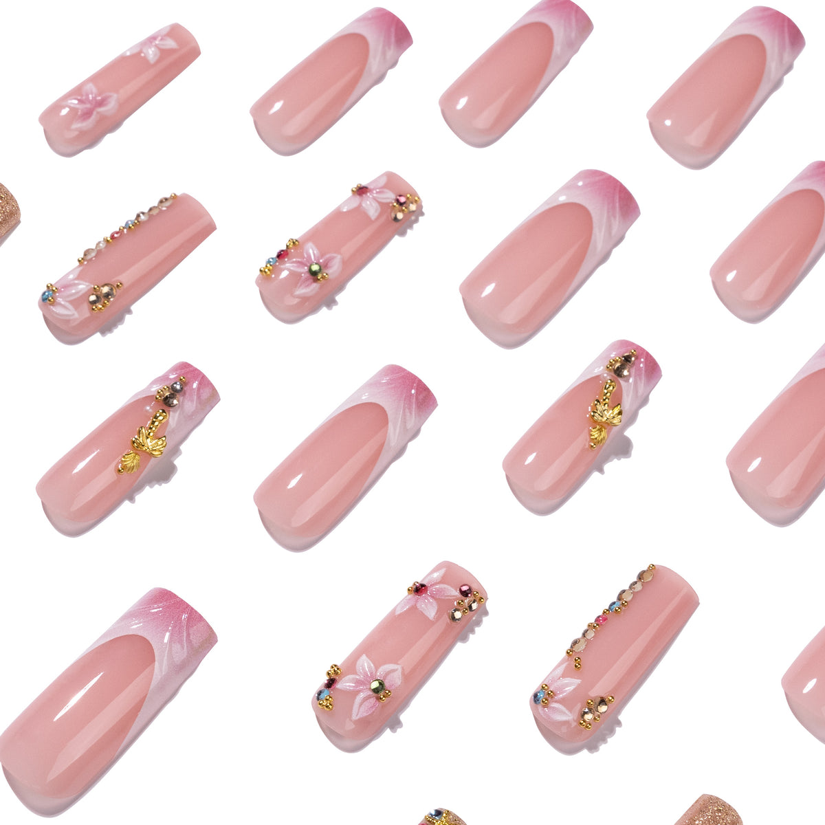Kunstvolle Nagelverlängerungen mit Strass- und Blütenverzierungen Brehn