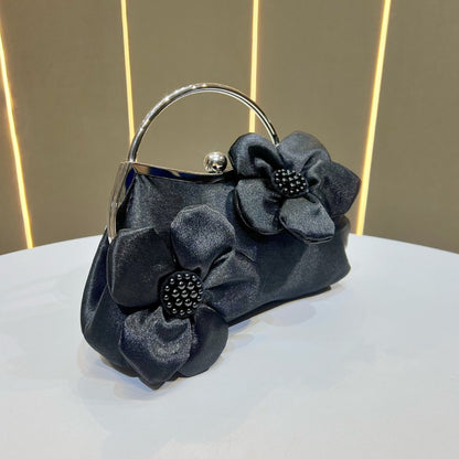 Florale Akzent Clutch