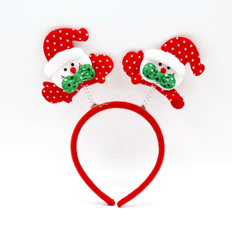 Festlicher Weihnachts-Haarreif mit lustigen Weihnachtsmannfiguren