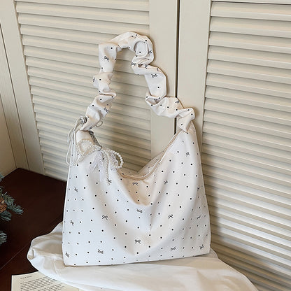 Lässige gepunktete schlabberige Handtasche