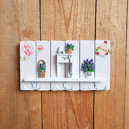 Dekorativer Wandhaken mit Blumenmuster