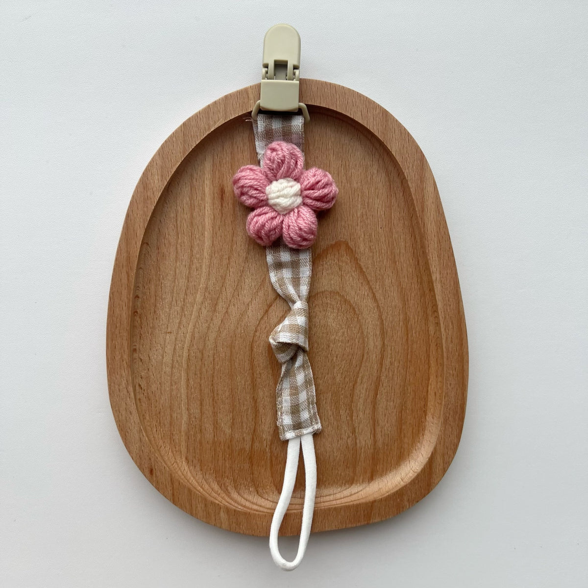 Schnuller- und Beißringclip mit Holz-Sicherheitsclip und gehäkelter Blume