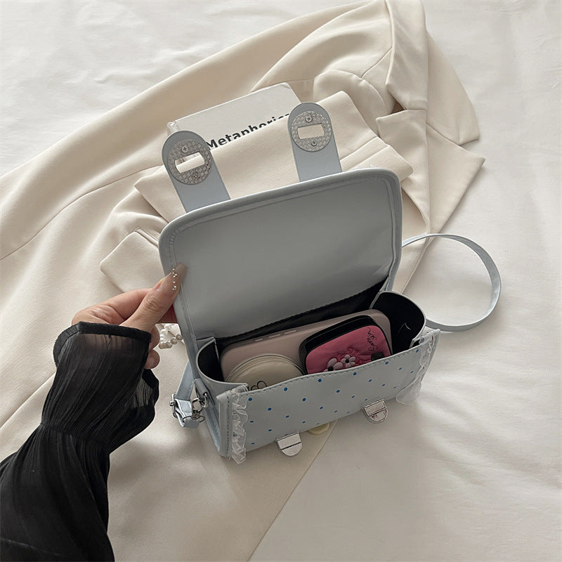 Dekorative kompakte Handtasche