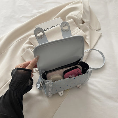 Dekorative kompakte Handtasche