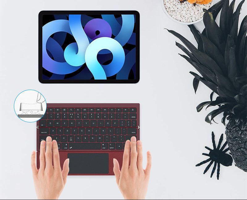 Kompakte kabellose Tastatur mit Touchpad Brehn