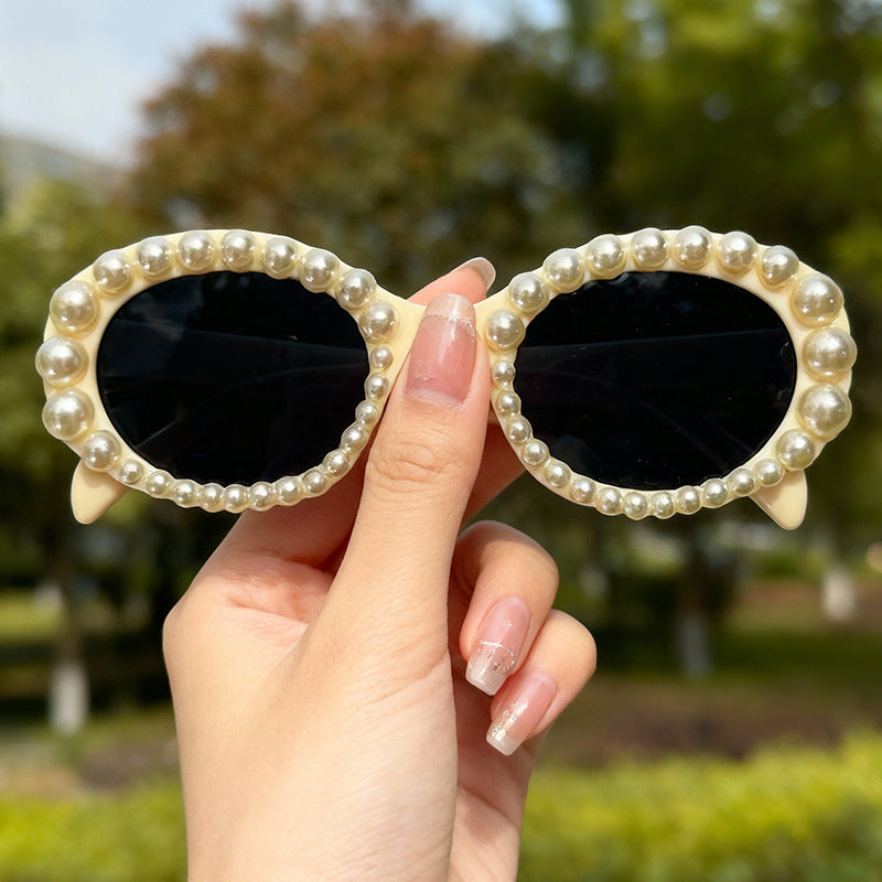 Dekorativer Perlenrahmen Sonnenbrille Brehn