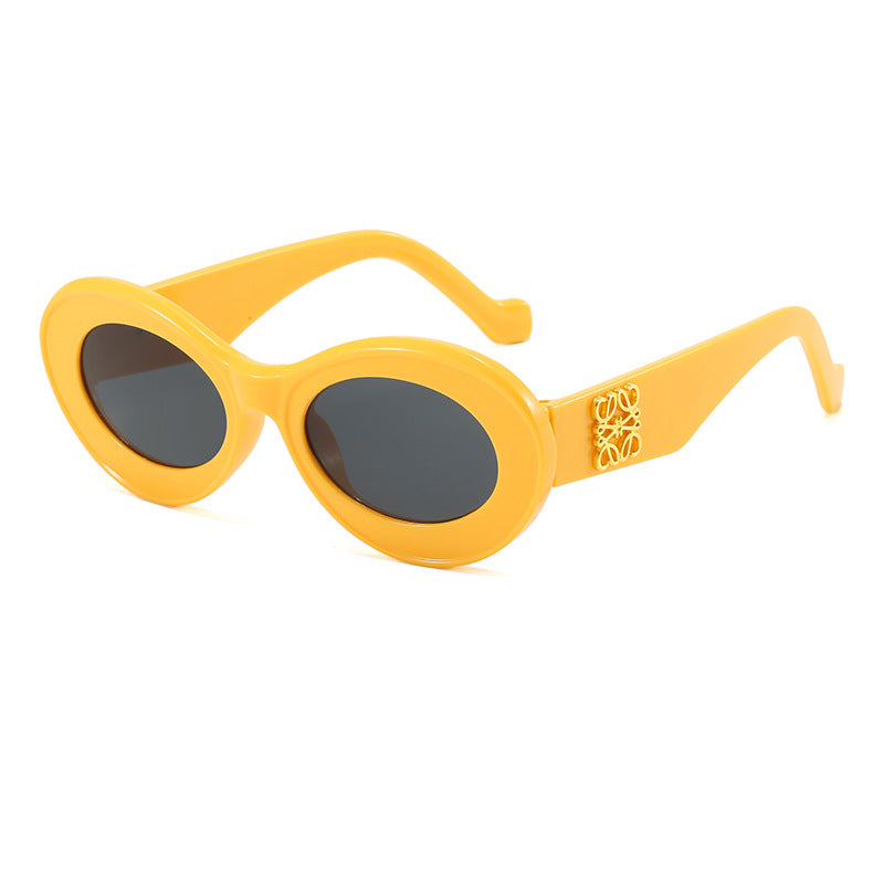 Damen modische Sonnenbrille mit ovalem Rahmen und goldenen Applikationen Brehn
