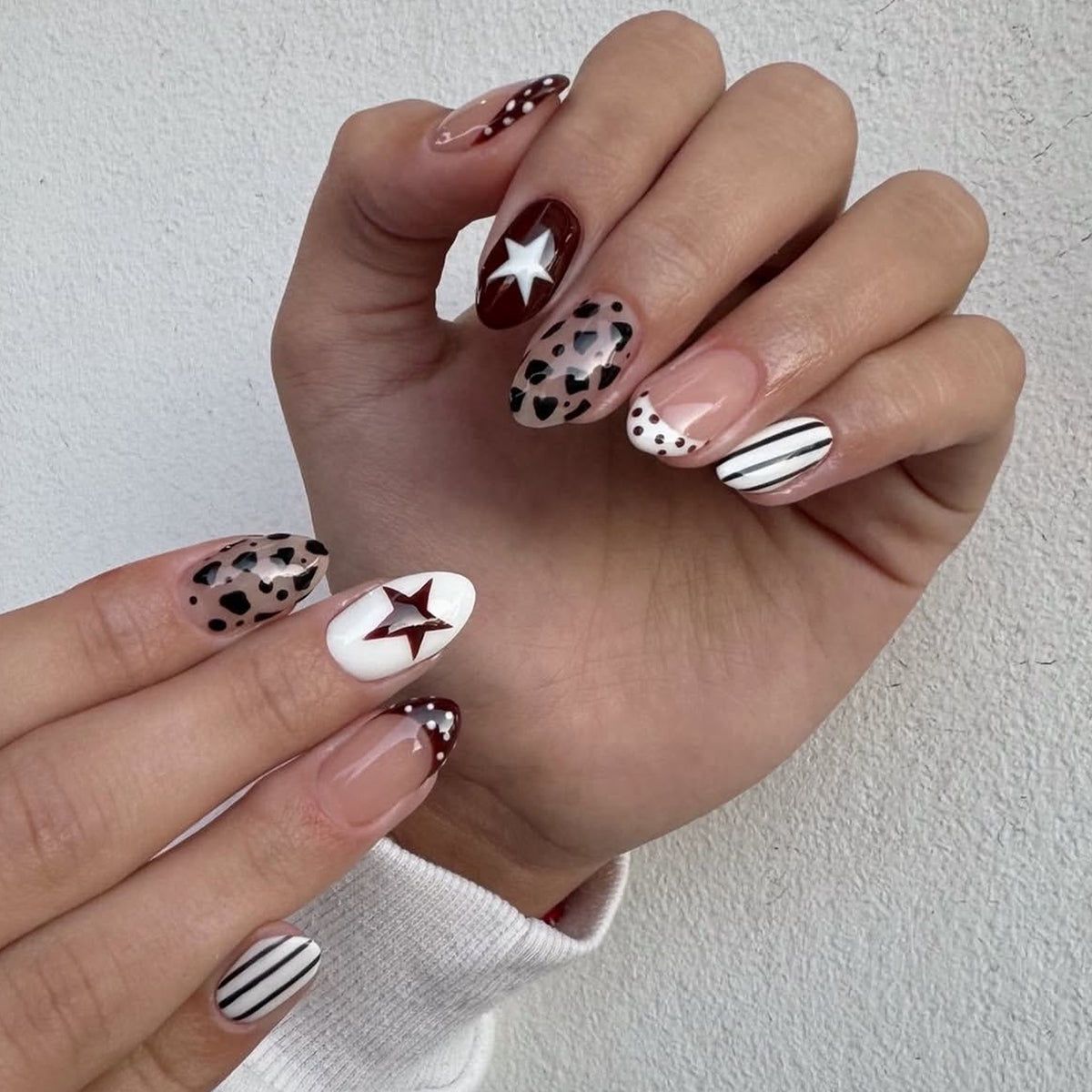 Kunstvolle Nagelgestaltung mit geometrischen Akzenten Brehn