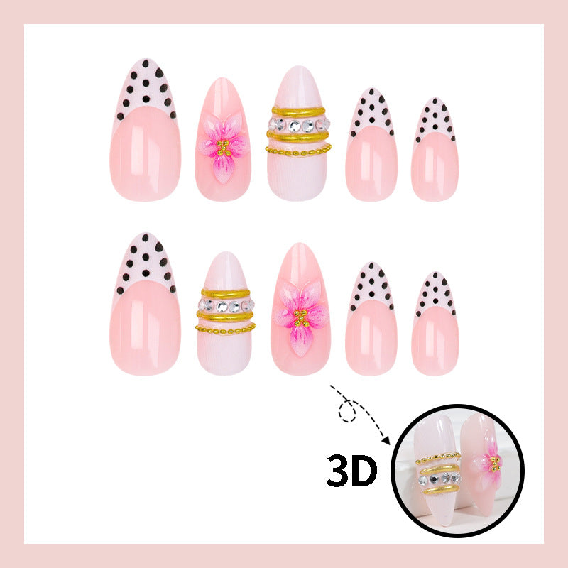 Kunstnagelset mit romantischen Blumenmotiven und eleganten Glitzerverzierungen Brehn