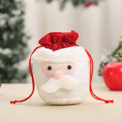 Niedlicher Weihnachtsgnom mit Geschenkesack Brehn