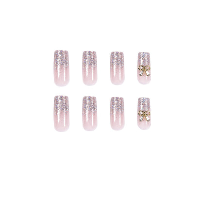 Kunstvolle Nagelverlängerungen mit Glitzer und Verzierung Brehn