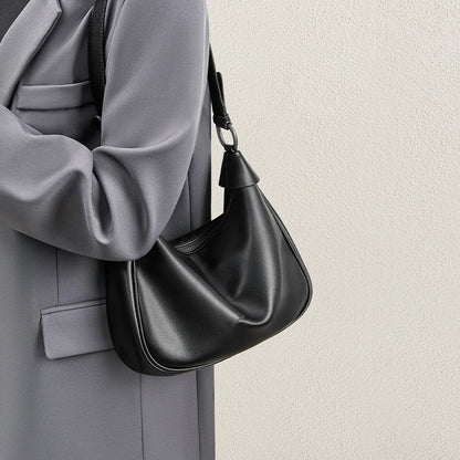 Stylische geschwungene Schultertasche Brehn