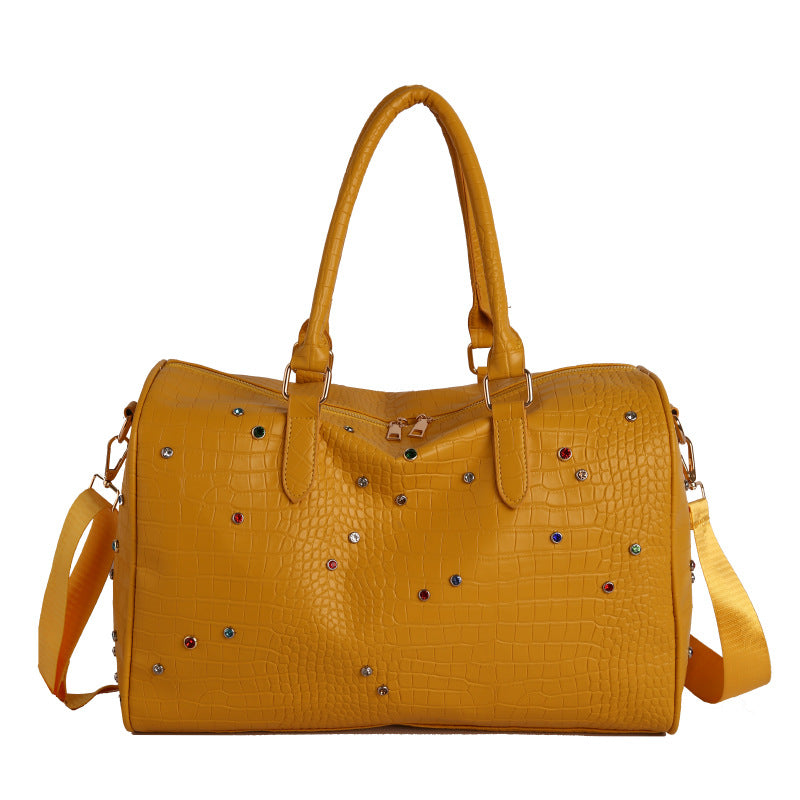 Elegante Handtasche mit Luxuriösem Kroko-Muster und Bunten Applikationen Brehn