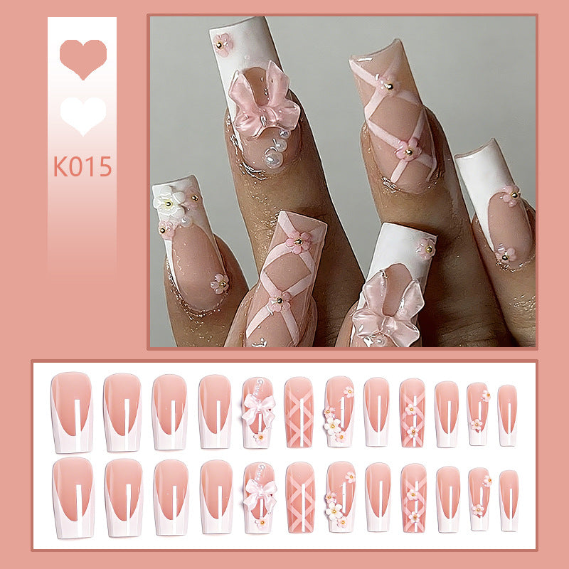 Kunstvolle 3D Nagelspitzen mit Schleifenmotiven Brehn