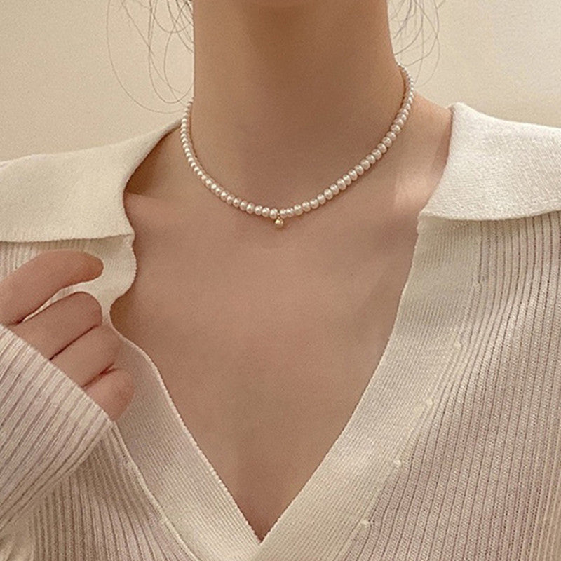 Zarte Perlenhalskette mit Eleganter Goldakzent Brehn