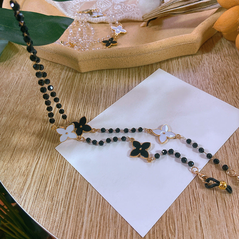 Elegante Perlenkette mit Blütenanhängern Brehn