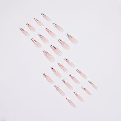 Kunstvolle Nagelverlängerungen mit eleganten Dots und schimmerndem Ombré Brehn